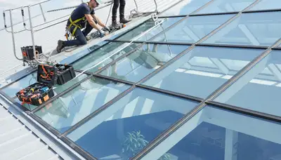 Dallas, TX siding contractor repairing skylight leaks and seals for local homes
